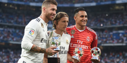 MADRID, SPAIN - SEPTEMBER 01: Sergio Ramos (left) Luka Modric (centre) and Keylor Navas of Real Madrid celebrate their 2017/18 UEFA Men's Defender, Player of the Year and Goalkeeper of the year awards respectively before the La Liga match between Real Madrid CF and CD Leganes at Estadio Santiago Bernabeu on September 1, 2018 in Madrid, Spain. (Photo by Denis Doyle/Getty Images)