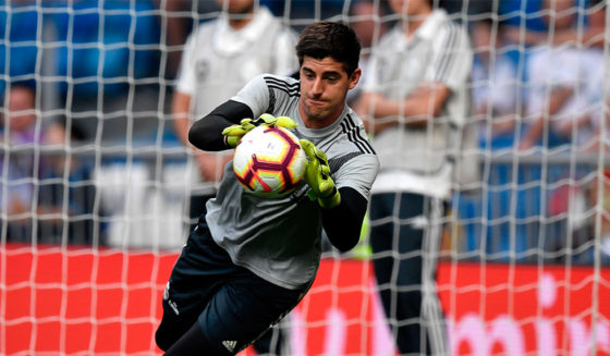 Real Madrid's Belgian goalkeeper Thibaut Courtois warms up before the Spanish league football match between Real Madrid CF and Club Deportivo Leganes SAD at the Santiago Bernabeu stadium in Madrid on September 1, 2018. (Photo by GABRIEL BOUYS / AFP) (Photo credit should read GABRIEL BOUYS/AFP/Getty Images)