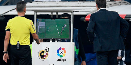 Spanish referee Santiago Jaime Latre (L) and Real Madrid's Spanish coach Julen Lopetegui check the VAR screen during the Spanish league football match between Real Madrid CF and Club Deportivo Leganes SAD at the Santiago Bernabeu stadium in Madrid on September 1, 2018. (Photo by GABRIEL BOUYS / AFP) (Photo credit should read GABRIEL BOUYS/AFP/Getty Images)
