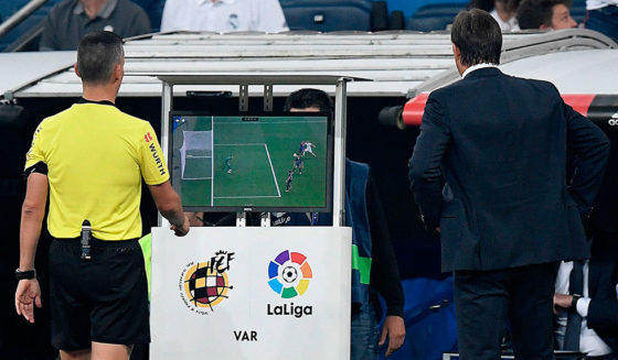 Spanish referee Santiago Jaime Latre (L) and Real Madrid's Spanish coach Julen Lopetegui check the VAR screen during the Spanish league football match between Real Madrid CF and Club Deportivo Leganes SAD at the Santiago Bernabeu stadium in Madrid on September 1, 2018. (Photo by GABRIEL BOUYS / AFP) (Photo credit should read GABRIEL BOUYS/AFP/Getty Images)