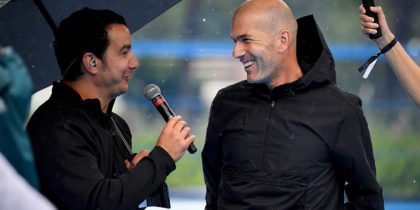 Former French football player and former Real Madrid coach Zinedine Zidane (C) speaks with French TV Sports commentator Thomas Thouroude (L) in Saint Denis, suburban Paris on June 11, 2018 during an event marking the 20th anniversary of France's 1998 World Cup victory. (Photo by Eric FEFERBERG / AFP) (Photo credit should read ERIC FEFERBERG/AFP/Getty Images)