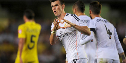 VILLARREAL, SPAIN - SEPTEMBER 14: Gareth Bale of Real Madrid celebrates scoring Real's opening goal during the La Liga match between Villarreal and Real Madrid at El Madrigal on September 14, 2013 in Villarreal, Spain. (Photo by Denis Doyle/Getty Images)