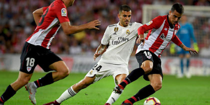 Real Madrid's Spanish midfielder Daniel Ceballos (C) vies with Athletic Bilbao's Spanish midfielder Oscar De Marcos (L) and Athletic Bilbao's Spanish midfielder Dani Garcia (R) during the Spanish league football match between Athletic Club Bilbao and Real Madrid CF at the San Mames stadium in Bilbao on September 15, 2018. (Photo by LLUIS GENE / AFP) (Photo credit should read LLUIS GENE/AFP/Getty Images)