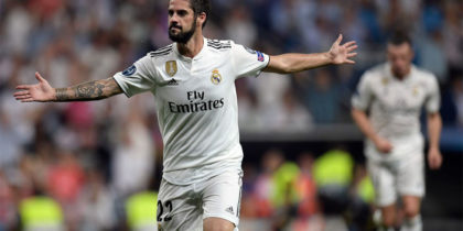 Real Madrid's Spanish midfielder Isco celebrates his team's opening goal during the UEFA Champions League group G football match between Real Madrid CF and AS Roma at the Santiago Bernabeu stadium in Madrid on September 19, 2018. (Photo by OSCAR DEL POZO / AFP) (Photo credit should read OSCAR DEL POZO/AFP/Getty Images)