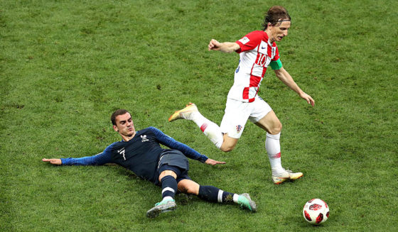 MOSCOW, RUSSIA - JULY 15: Antoine Griezmann of France challenges Luka Modric of Croatia during the 2018 FIFA World Cup Final between France and Croatia at Luzhniki Stadium on July 15, 2018 in Moscow, Russia. (Photo by Catherine Ivill/Getty Images)