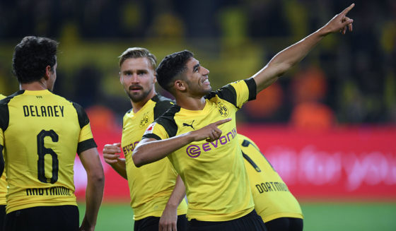Dortmund's Moroccan defender Achraf Hakimi celebrates scoring his team's third goal during the German first division Bundesliga football match Borussia Dortmund vs 1. FC Nuremberg in Dortmund, westhern Germany, on September 26, 2018. (Photo by Patrik STOLLARZ / AFP) / RESTRICTIONS: DFL REGULATIONS PROHIBIT ANY USE OF PHOTOGRAPHS AS IMAGE SEQUENCES AND/OR QUASI-VIDEO (Photo credit should read PATRIK STOLLARZ/AFP/Getty Images)