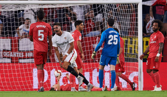 SEVILLE, SPAIN - SEPTEMBER 26: Andre Silva of Sevilla FC celebrates after scoring his team's second goal during the La Liga match between Sevilla FC and Real Madrid CF at Estadio Ramon Sanchez Pizjuan on September 26, 2018 in Seville, Spain. (Photo by Aitor Alcalde/Getty Images)