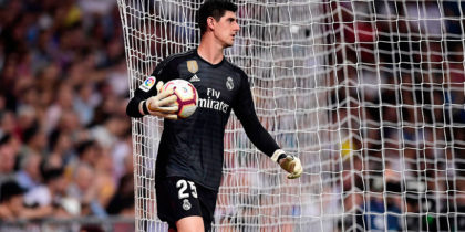 Real Madrid's Belgian goalkeeper Thibaut Courtois grabs the ball during the Spanish league football match between Real Madrid CF and RCD Espanyol at the Santiago Bernabeu stadium in Madrid on September 22, 2018. (Photo by JAVIER SORIANO / AFP) (Photo credit should read JAVIER SORIANO/AFP/Getty Images)