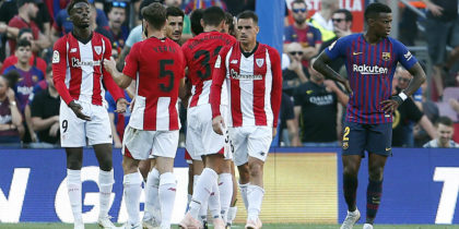 Athletic players celebrate scoring the opener during the Spanish league football match between FC Barcelona and Athletic Club Bilbao at the Camp Nou stadium in Barcelona on September 29, 2018. (Photo by Pau Barrena / AFP) (Photo credit should read PAU BARRENA/AFP/Getty Images)