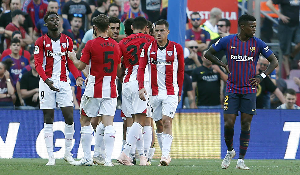 Athletic players celebrate scoring the opener during the Spanish league football match between FC Barcelona and Athletic Club Bilbao at the Camp Nou stadium in Barcelona on September 29, 2018. (Photo by Pau Barrena / AFP) (Photo credit should read PAU BARRENA/AFP/Getty Images)