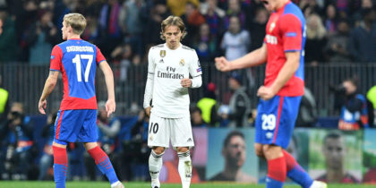Real Madrid's Croatian midfielder Luka Modric reacts as CSKA Moscow's players celebrate the victory after the UEFA Champions League group G football match between PFC CSKA Moscow and Real Madrid CF at the Luzhniki stadium in Moscow on October 2, 2018. (Photo by Mladen ANTONOV / AFP) (Photo credit should read MLADEN ANTONOV/AFP/Getty Images)
