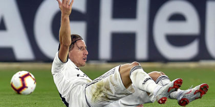 Real Madrid's Croatian midfielder Luka Modric gestures from the ground during the Spanish league football match between Deportivo Alaves and Real Madrid CF at the Mendizorroza stadium in Vitoria on October 6, 2018. (Photo by ANDER GILLENEA / AFP) (Photo credit should read ANDER GILLENEA/AFP/Getty Images)