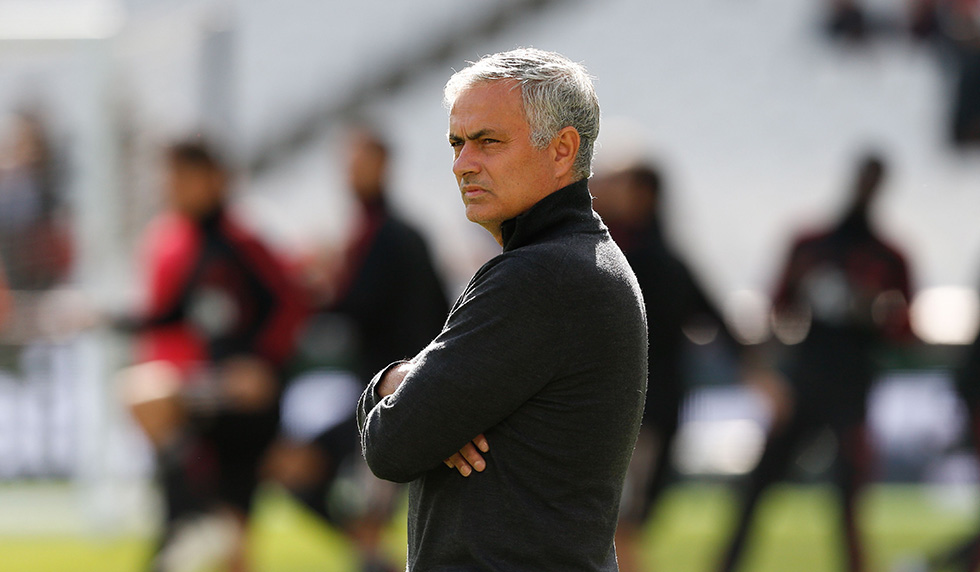 Manchester United's Portuguese manager Jose Mourinho is seen during the warm up ahead of the English Premier League football match between West Ham United and Manchester United at The London Stadium, in east London on September 29, 2018. (Photo by Ian KINGTON / AFP) / RESTRICTED TO EDITORIAL USE. No use with unauthorized audio, video, data, fixture lists, club/league logos or 'live' services. Online in-match use limited to 120 images. An additional 40 images may be used in extra time. No video emulation. Social media in-match use limited to 120 images. An additional 40 images may be used in extra time. No use in betting publications, games or single club/league/player publications. / (Photo credit should read IAN KINGTON/AFP/Getty Images)