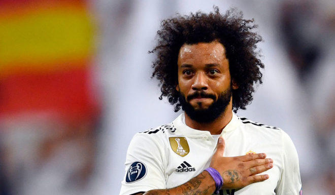 Real Madrid's Brazilian defender Marcelo celebrates scoring his team's second goal during the UEFA Champions League group G football match between Real Madrid CF and FC Viktoria Plzen at the Santiago Bernabeu stadium in Madrid on October 23, 2018. (Photo by GABRIEL BOUYS / AFP) (Photo credit should read GABRIEL BOUYS/AFP/Getty Images)