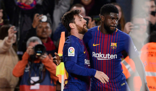 Barcelona's Argentinian forward Lionel Messi (L) celebrates a goal with Barcelona's French defender Samuel Umtiti during the Spanish league football match between FC Barcelona and Deportivo Alaves at the Camp Nou stadium in Barcelona on January 28, 2018. / AFP PHOTO / Josep LAGO (Photo credit should read JOSEP LAGO/AFP/Getty Images