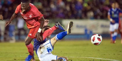Real Madrid's Brazilian forward Vinicius Junior (L) vies with UD Melilla's Spanish defender Ricardo Segura Richi during the Spanish King's Cup football match between UD Melilla and Real Madrid CF at the Alvarez Claro municipal stadium in the autonomous city of Melilla on October 31, 2018. (Photo by JORGE GUERRERO / AFP) (Photo credit should read JORGE GUERRERO/AFP/Getty Images)