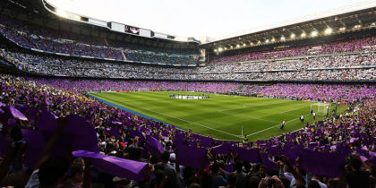 A general view shows Real Madrid fans display purple and white papers before the UEFA Champions League semi-final second leg football match Real Madrid CF vs Manchester City FC at the Santiago Bernabeu stadium in Madrid, on May 4, 2016. / AFP / CESAR MANSO (Photo credit should read CESAR MANSO/AFP/Getty Images)
