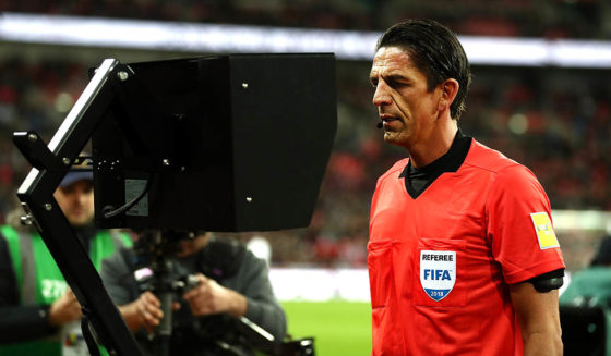 LONDON, ENGLAND - MARCH 27: Referee Deniz Aytekin checks the VAR during the International friendly between England and Italy at Wembley Stadium on March 27, 2018 in London, England. (Photo by Catherine Ivill/Getty Images)