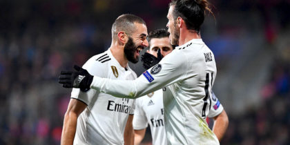 Real Madrid's French forward Karim Benzema celebrates with teammates after scoring during the UEFA Champions League group G football match Viktoria Plzen v Real Madrid in Plzen, Czech Republic on November 7, 2018. (Photo by JOE KLAMAR / AFP) (Photo credit should read JOE KLAMAR/AFP/Getty Images)