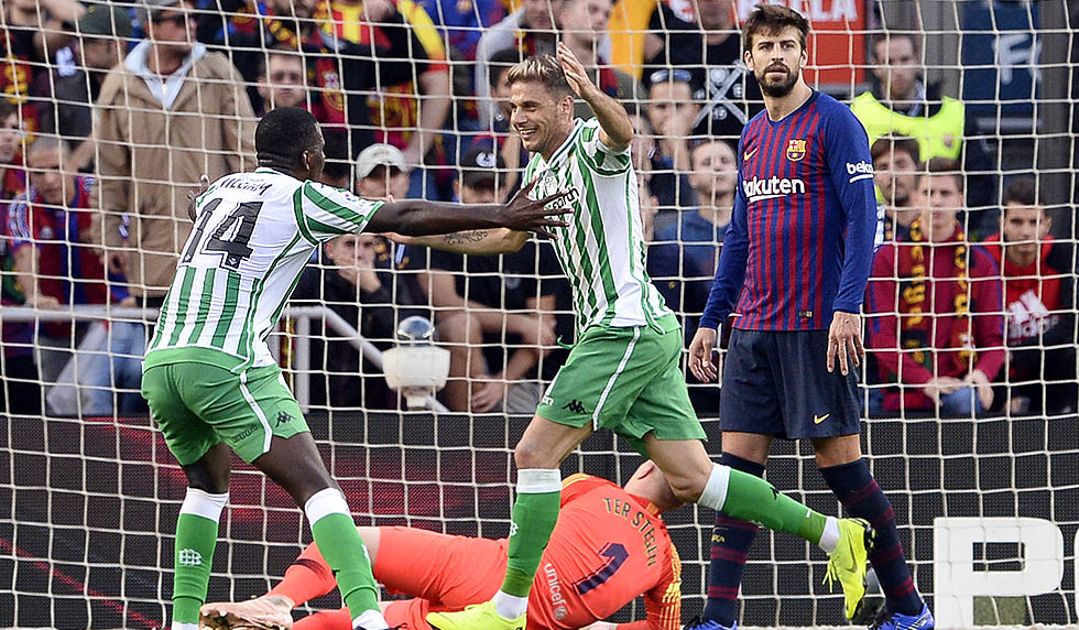 Real Betis' Spanish midfielder Joaquin (C) celebrates scoring his team's second goal during the Spanish league football match between FC Barcelona and Real Betis at the Camp Nou stadium in Barcelona on November 11, 2018. (Photo by Josep LAGO / AFP) (Photo credit should read JOSEP LAGO/AFP/Getty Images)