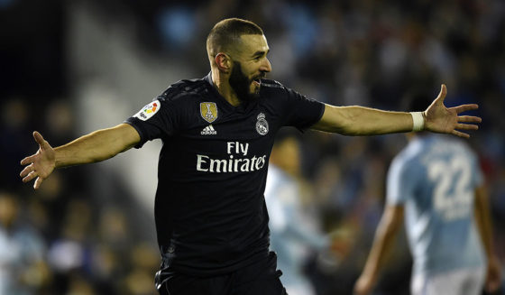 Real Madrid's French forward Karim Benzema celebrates after scoring the opening goal during the Spanish league football match between RC Celta de Vigo and Real Madrid CF at the Balaidos stadium in Vigo on November 11, 2018. (Photo by MIGUEL RIOPA / AFP) (Photo credit should read MIGUEL RIOPA/AFP/Getty Images)