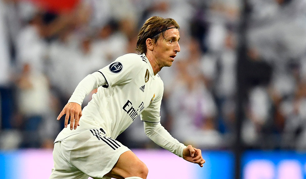 Real Madrid's Croatian midfielder Luka Modric (L) vies with Viktoria Plzen's Czech midfielder Ales Cermak during the UEFA Champions League group G football match between Real Madrid CF and FC Viktoria Plzen at the Santiago Bernabeu stadium in Madrid on October 23, 2018. (Photo by GABRIEL BOUYS / AFP) (Photo credit should read GABRIEL BOUYS/AFP/Getty Images)