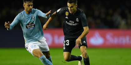 VIGO, SPAIN - NOVEMBER 11: Hugo Mallo of Celta de Vigo competes for the ball with Sergio Reguilon of Real Madrid during the La Liga match between RC Celta de Vigo and Real Madrid CF at Abanca-Balaidos on November 11, 2018 in Vigo, Spain. (Photo by Octavio Passos/Getty Images)
