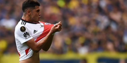 River Plate's Exequiel Palacios celebrates after teammate Lucas Pratto (out of frame) scored their team's first goal against Boca Juniors, during their first leg match of the all-Argentine Copa Libertadores final, at La Bombonera stadium in Buenos Aires, on November 11, 2018. - River Plate twice came from behind to snatch a 2-2 draw with fierce rivals Boca Juniors in first leg of their weather-delayed 'Superclasico' Copa Libertadores final on Sunday. (Photo by Eitan ABRAMOVICH / AFP) (Photo credit should read EITAN ABRAMOVICH/AFP/Getty Images)