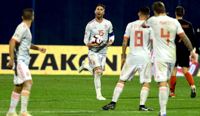 Spain's defender Sergio Ramos (C) talks to team mates after he scored a goal during the UEFA Nations League football match between Croatia and Spain at the Maksimir Stadium in Zagreb on November 15, 2108. (Photo by - / AFP) (Photo credit should read -/AFP/Getty Images)