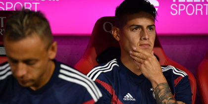 MUNICH, GERMANY - AUGUST 24: James Rodriguez of Bayern Muenchen sits on the bench during the Bundesliga match between FC Bayern Muenchen and TSG 1899 Hoffenheim at Allianz Arena on August 24, 2018 in Munich, Germany. (Photo by Sebastian Widmann/Bongarts/Getty Images)