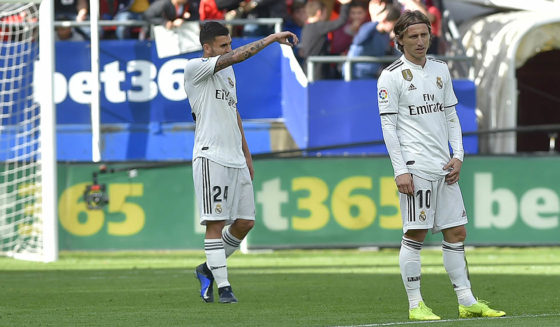 (FromL) Real Madrid's Belgian goalkeeper Thibaut Courtois, Real Madrid's Spanish midfielder Daniel Ceballos and Real Madrid's Croatian midfielder Luka Modric react after Eibar's Argentinian midfielder Gonzalo Escalante scored a goal during the Spanish league football match between SD Eibar and Real Madrid CF at the Ipurua stadium in Eibar on November 24, 2018. (Photo by ANDER GILLENEA / AFP) (Photo credit should read ANDER GILLENEA/AFP/Getty Images)