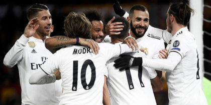 (From L) Real Madrid's Spanish defender Sergio Ramos, Real Madrid's Croatian midfielder Luka Modric, Real Madrid's Brazilian defender Marcelo, Real Madrid's Spanish midfielder Lucas Vazquez, Real Madrid's French forward Karim Benzema and Real Madrid's Welsh forward Gareth Bale celebrate after Vazquez scored 0-2 during the UEFA Champions League group G football match AS Rome vs Real Madrid on November 27, 2018 at the Olympic stadium in Rome. (Photo by Filippo MONTEFORTE / AFP) (Photo credit should read FILIPPO MONTEFORTE/AFP/Getty Images)