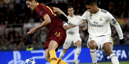 AS Roma Czech forward Patrik Schick (L) holds off Real Madrid's French defender Raphael Varane during the UEFA Champions League group G football match AS Rome vs Real Madrid on November 27, 2018 at the Olympic stadium in Rome. (Photo by Filippo MONTEFORTE / AFP) (Photo credit should read FILIPPO MONTEFORTE/AFP/Getty Images)