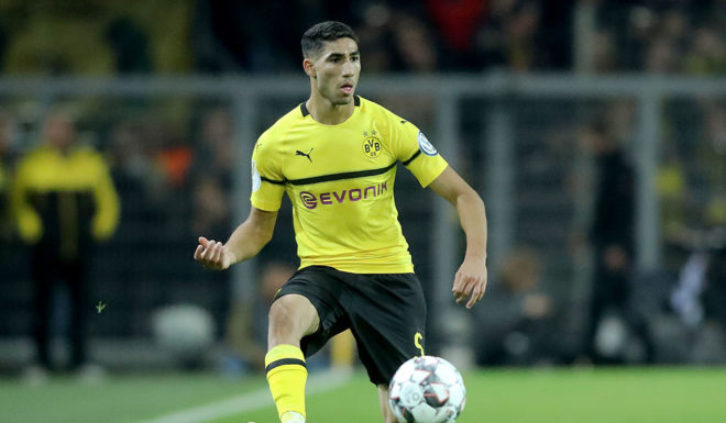 DORTMUND, GERMANY - OCTOBER 31: Achraf Hakimi of Dortmund runs with the ball during the DFB Cup match between Borusssia Dortmund and 1. FC Union Berlin at Signal Iduna Park on October 31, 2018 in Dortmund, Germany. (Photo by Christof Koepsel/Bongarts/Getty Images)