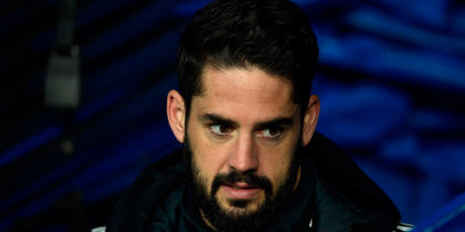 Real Madrid's Spanish midfielder Isco arrives to sit on the bench during the Spanish league football match between Real Madrid and Valencia at the Santiago Bernabeu stadium in Madrid on December 1, 2018. (Photo by OSCAR DEL POZO / AFP) (Photo credit should read OSCAR DEL POZO/AFP/Getty Images)