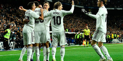 Real Madrid's Spanish defender Dani Carvajal (back 3rd L) celebrates with teammates after scoring a goal during the Spanish league football match between Real Madrid and Valencia at the Santiago Bernabeu stadium in Madrid on December 1, 2018. (Photo by OSCAR DEL POZO / AFP) (Photo credit should read OSCAR DEL POZO/AFP/Getty Images)