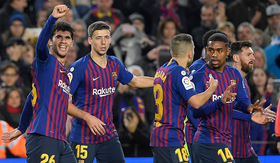 Barcelona's Spanish midfielder Carles Alena (L) celebrates after scoring during the Spanish league football match FC Barcelona against Villarreal CF at the Camp Nou stadium in Barcelona on December 2, 2018. (Photo by LLUIS GENE / AFP) (Photo credit should read LLUIS GENE/AFP/Getty Images)