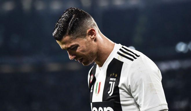 Juventus' Portuguese forward Cristiano Ronaldo reacts during the Italian Serie A football match Juventus vs Spal 2013 on November 24, 2018 at the Juventus stadium in Turin. (Photo by Marco BERTORELLO / AFP) (Photo credit should read MARCO BERTORELLO/AFP/Getty Images)