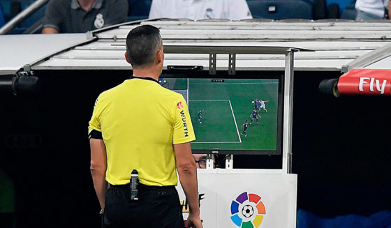 Spanish referee Santiago Jaime Latre (L) and Real Madrid's Spanish coach Julen Lopetegui check the VAR screen during the Spanish league football match between Real Madrid CF and Club Deportivo Leganes SAD at the Santiago Bernabeu stadium in Madrid on September 1, 2018. (Photo by GABRIEL BOUYS / AFP) (Photo credit should read GABRIEL BOUYS/AFP/Getty Images)
