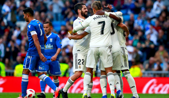 MADRID, SPAIN - DECEMBER 06: Marco Asensio of Real Madrid (obscured) celebrates after scoring his team's second goal with team mates during the Copa del Rey fourth round match between Real Madrid and Melilla at Estadio Bernabeu on December 6, 2018 in Madrid, Spain. (Photo by Gonzalo Arroyo Moreno/Getty Images)