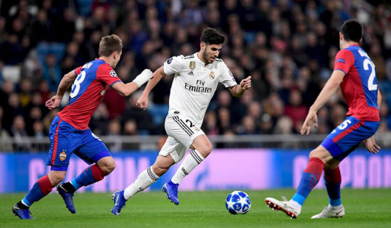 Real Madrid's Spanish midfielder Marco Asensio (C) vies with CSKA Moscow's Russian midfielder Ivan Oblyakov (L) during the UEFA Champions League group G football match between Real Madrid CF and CSKA Moscow at the Santiago Bernabeu stadium in Madrid on December 12, 2018. (Photo by JAVIER SORIANO / AFP) (Photo credit should read JAVIER SORIANO/AFP/Getty Images)