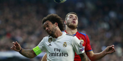 MADRID, SPAIN - DECEMBER 12: Nikola Vlasic of CSKA Moscow competes for a header with Marcelo of Real Madrid during the UEFA Champions League Group G match between Real Madrid and CSKA Moscow at Bernabeu on December 12, 2018 in Madrid, Spain. (Photo by Gonzalo Arroyo Moreno/Getty Images)