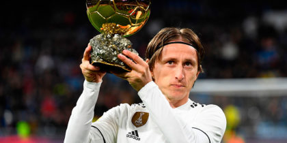 Real Madrid's Croatian midfielder Luka Modric poses with his Ballon d'Or trophy before the Spanish League football match between Real Madrid and Rayo Vallecano at the Santiago Bernabeu stadium in Madrid on December 15, 2018. (Photo by GABRIEL BOUYS / AFP) (Photo credit should read GABRIEL BOUYS/AFP/Getty Images)