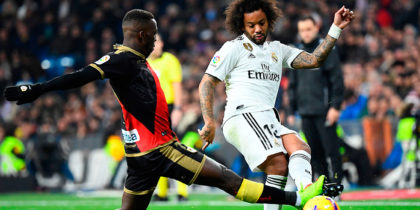 Rayo Vallecano's Peruvian defender Luis Advincula (L) vies with Real Madrid's Brazilian defender Marcelo during the Spanish League football match between Real Madrid and Rayo Vallecano at the Santiago Bernabeu stadium in Madrid on December 15, 2018. (Photo by GABRIEL BOUYS / AFP) (Photo credit should read GABRIEL BOUYS/AFP/Getty Images)