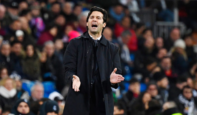 Real Madrid's Argentinian coach Santiago Solari applauds from the sideline during the Spanish League football match between Real Madrid and Rayo Vallecano at the Santiago Bernabeu stadium in Madrid on December 15, 2018. (Photo by GABRIEL BOUYS / AFP) (Photo credit should read GABRIEL BOUYS/AFP/Getty Images)