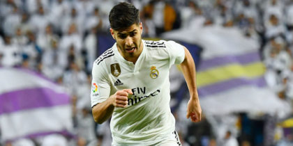 Real Madrid's Spanish midfielder Marco Asensio controls the ball during the Spanish League football match between Real Madrid and Rayo Vallecano at the Santiago Bernabeu stadium in Madrid on December 15, 2018. (Photo by GABRIEL BOUYS / AFP) (Photo credit should read GABRIEL BOUYS/AFP/Getty Images)