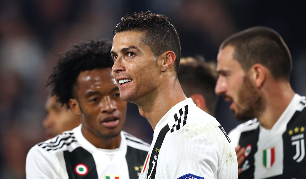 TURIN, ITALY - NOVEMBER 07: Cristiano Ronaldo of Juventus celebrates with his teammates after he scores his sides first goal during the UEFA Champions League Group H match between Juventus and Manchester United at Juventus Stadium on November 7, 2018 in Turin, Italy. (Photo by Michael Steele/Getty Images)