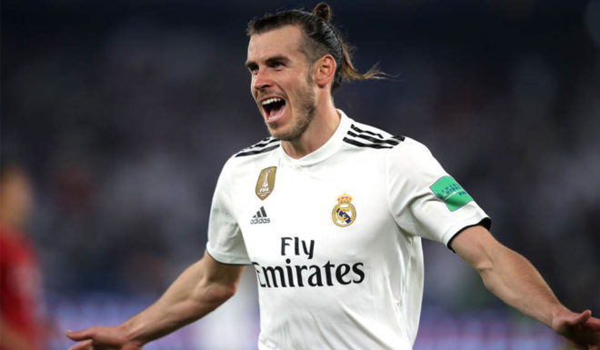 ABU DHABI, UNITED ARAB EMIRATES - DECEMBER 19: Gareth Bale of Real Madrid celebrates scoring their second goal during the FIFA Club World Cup semi-final match between Kashima Antlers and Real Madrid at Zayed Sports City Stadium on December 19, 2018 in Abu Dhabi, United Arab Emirates. (Photo by Francois Nel/Getty Images)