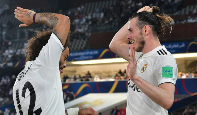 Real Madrid's Welsh forward Gareth Bale celebrates after scoring his team's opening goal during the semi final football match of the FIFA Club World Cup 2018 tournament between Japan's Kashima Antlers and Spain's Real Madrid at the Zayed Sports City Stadium in Abu Dhabi, the capital of the United Arab Emirates, on December 19, 2018. (Photo by Giuseppe CACACE / AFP) (Photo credit should read GIUSEPPE CACACE/AFP/Getty Images)