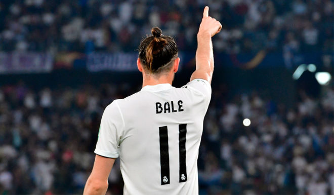 Real Madrid's Welsh forward Gareth Bale celebrates his goal during the semi final football match of the FIFA Club World Cup 2018 tournament between Japan's Kashima Antlers and Spain's Real Madrid at the Zayed Sports City Stadium in Abu Dhabi, the capital of the United Arab Emirates, on December 19, 2018. (Photo by Giuseppe CACACE / AFP) (Photo credit should read GIUSEPPE CACACE/AFP/Getty Images)